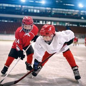 76348622-young-children-play-ice-hockey